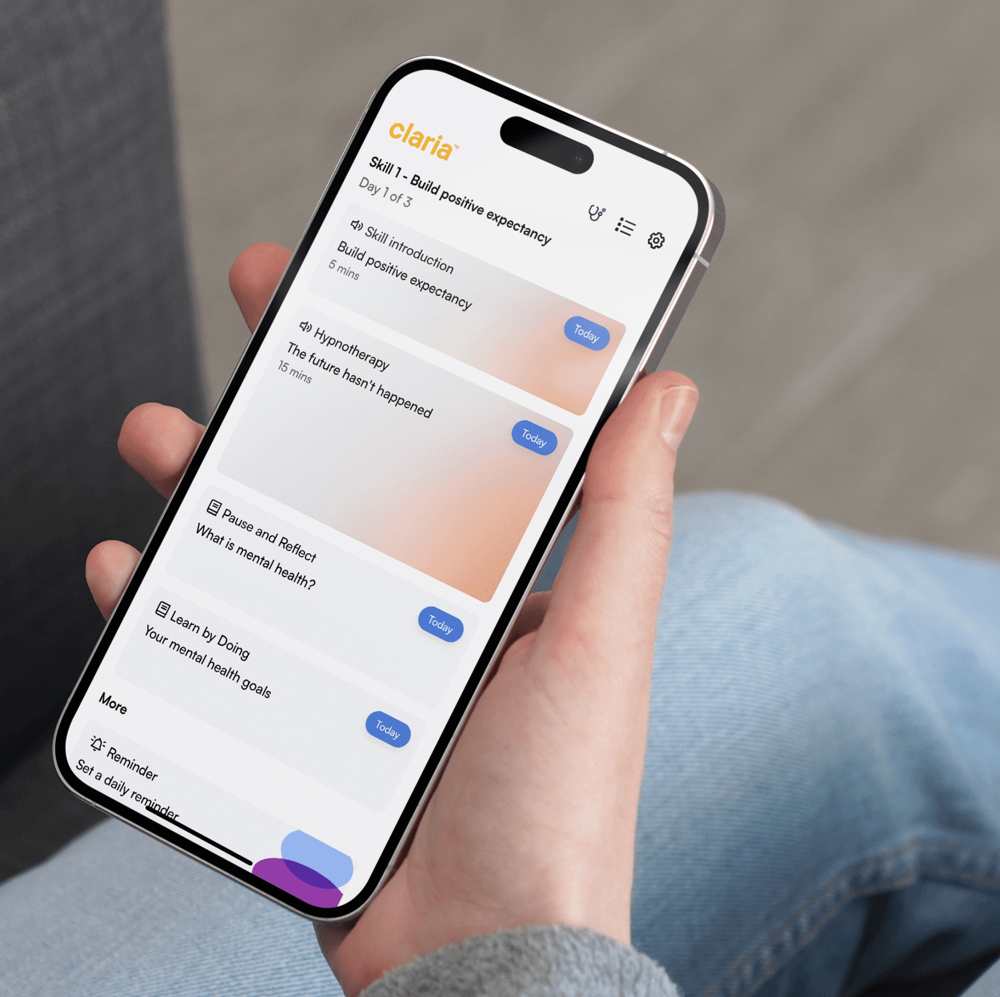 A hand holding a phone showing the Claria app's daily sessions